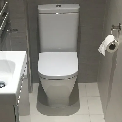 Stone Heat Ltd - Cloak Room - White Toilet - Loughton 